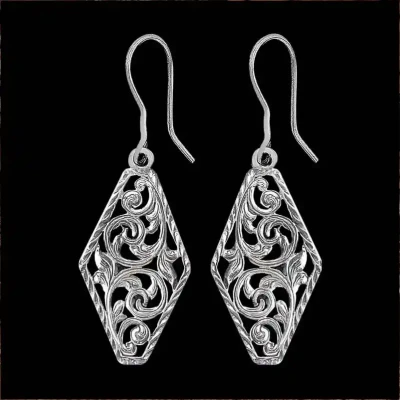 A pair of silver western earrings for women, hexagonal shaped, with filigrane details, antique finish
